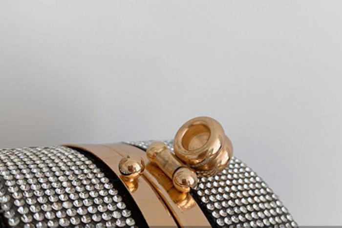 Detail of stylish gold clasp on Happy Lux Crossbody.