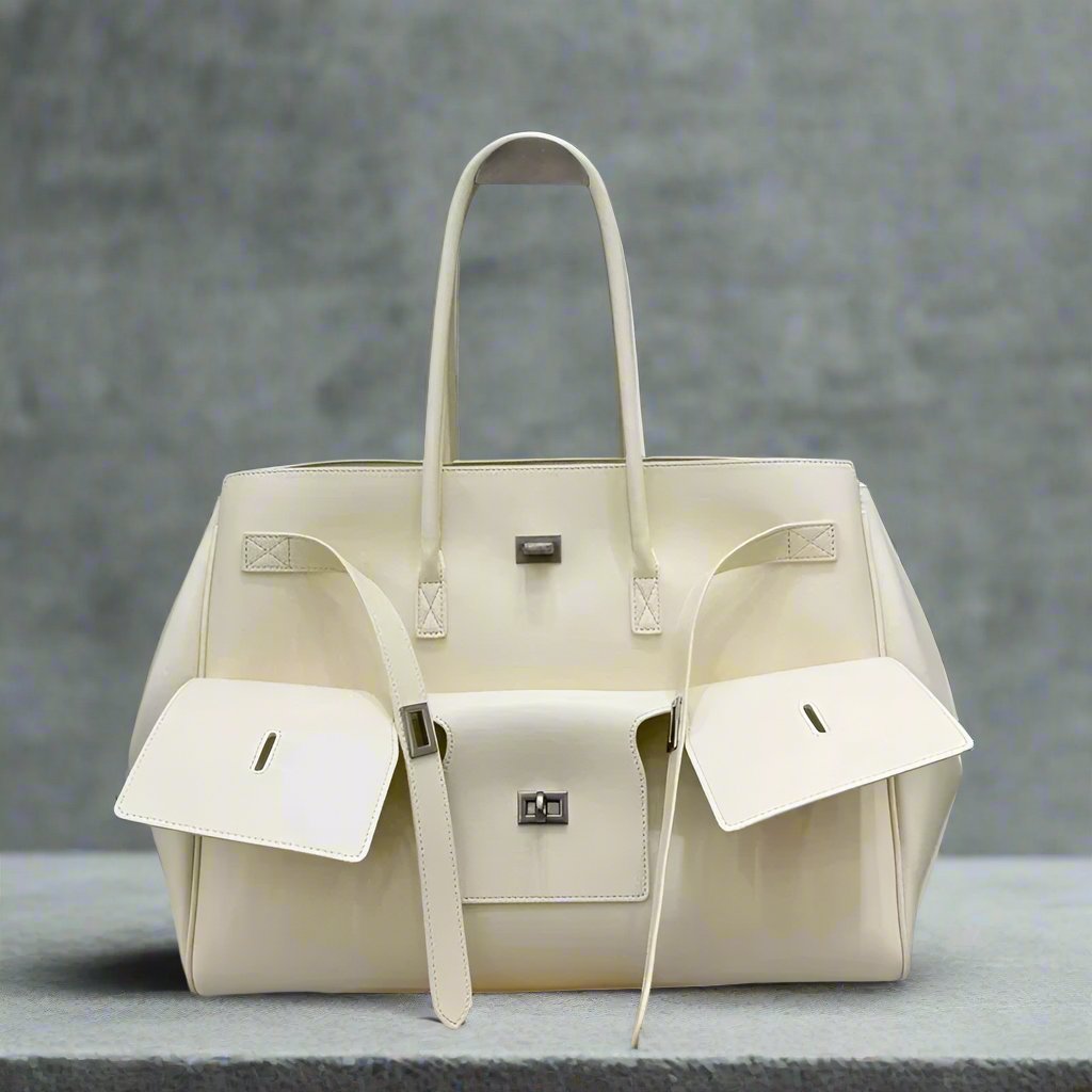 Luxurious modern ivory tote bag featuring silver accents, perfect for chic and stylish everyday use. Fall 2024 collection. front view.