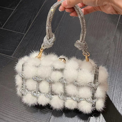 Soirée Éclat Clutch in Blanc Étoile, highlighting white fur and intricate detailing.