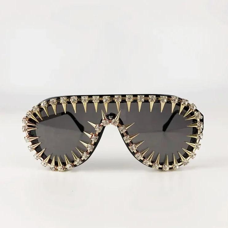 Front view of Spiked Crystal Shield sunglasses, dark lenses, crystal embellishments, edgy style.